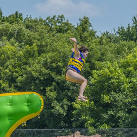 Wibit Jumping into Lake Image